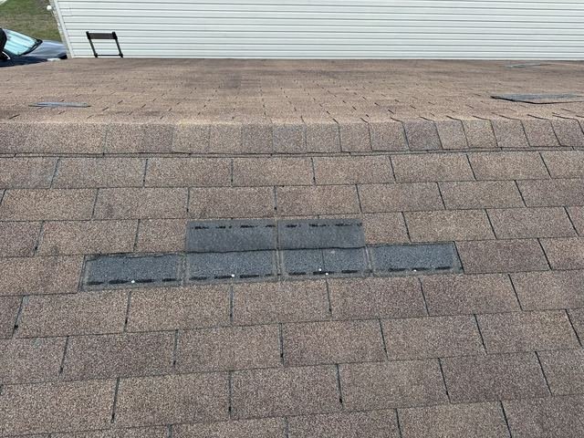 Shingle roof marked during a hail inspection