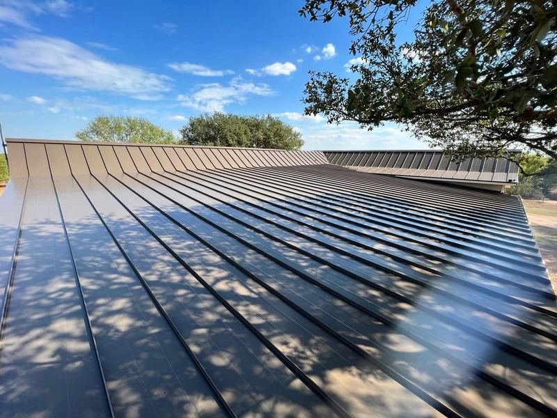 New dark standing seam metal roof